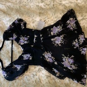 NWT floral romper. Lightweight and frilly, perfect for a summer or spring outing